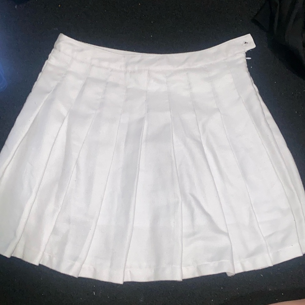 White pleated skirt